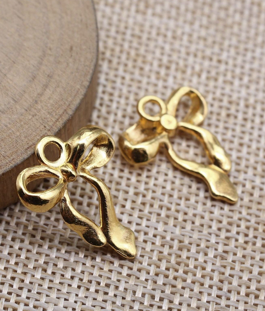 Charms numero 6 - Nœud gold